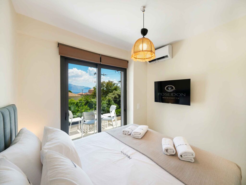 Poseidon Maisonette, a spacious two-storey three-bedroom holiday accommodation in the center of Nikiana, Lefkada.