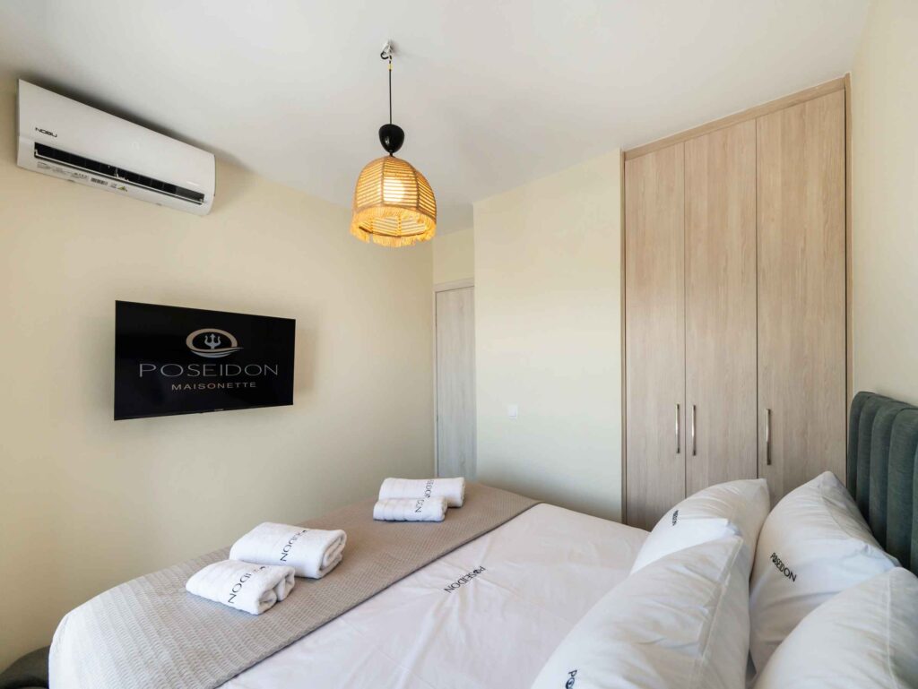Poseidon Maisonette, a spacious two-storey three-bedroom holiday accommodation in the center of Nikiana, Lefkada.