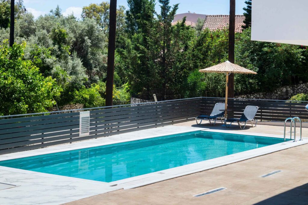Swimming pool at Poseidon Maisonette in Nikiana, Lefkada, offering a relaxing outdoor space for guests.