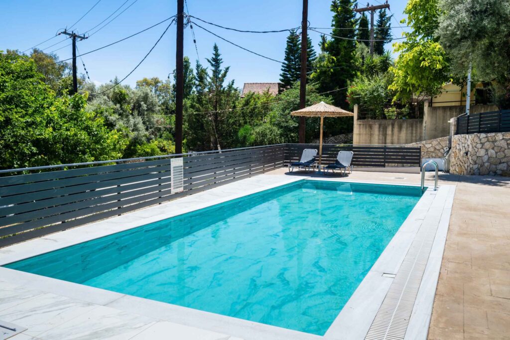 Swimming pool at Poseidon Maisonette in Nikiana, Lefkada, offering a relaxing outdoor space for guests.