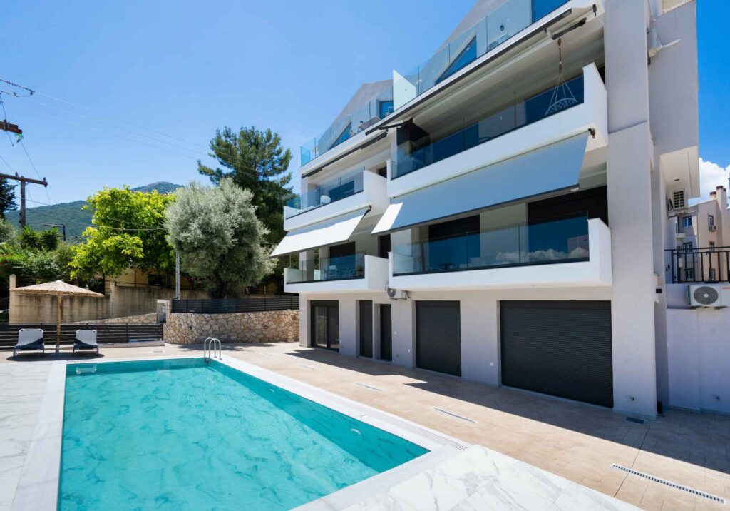 Swimming pool at Poseidon Maisonette in Nikiana, Lefkada, offering a relaxing outdoor space for guests.